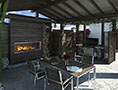 Lanai 48 - Photo - Dark Patio Driftwood Logs - 4C - Low Res.jpg